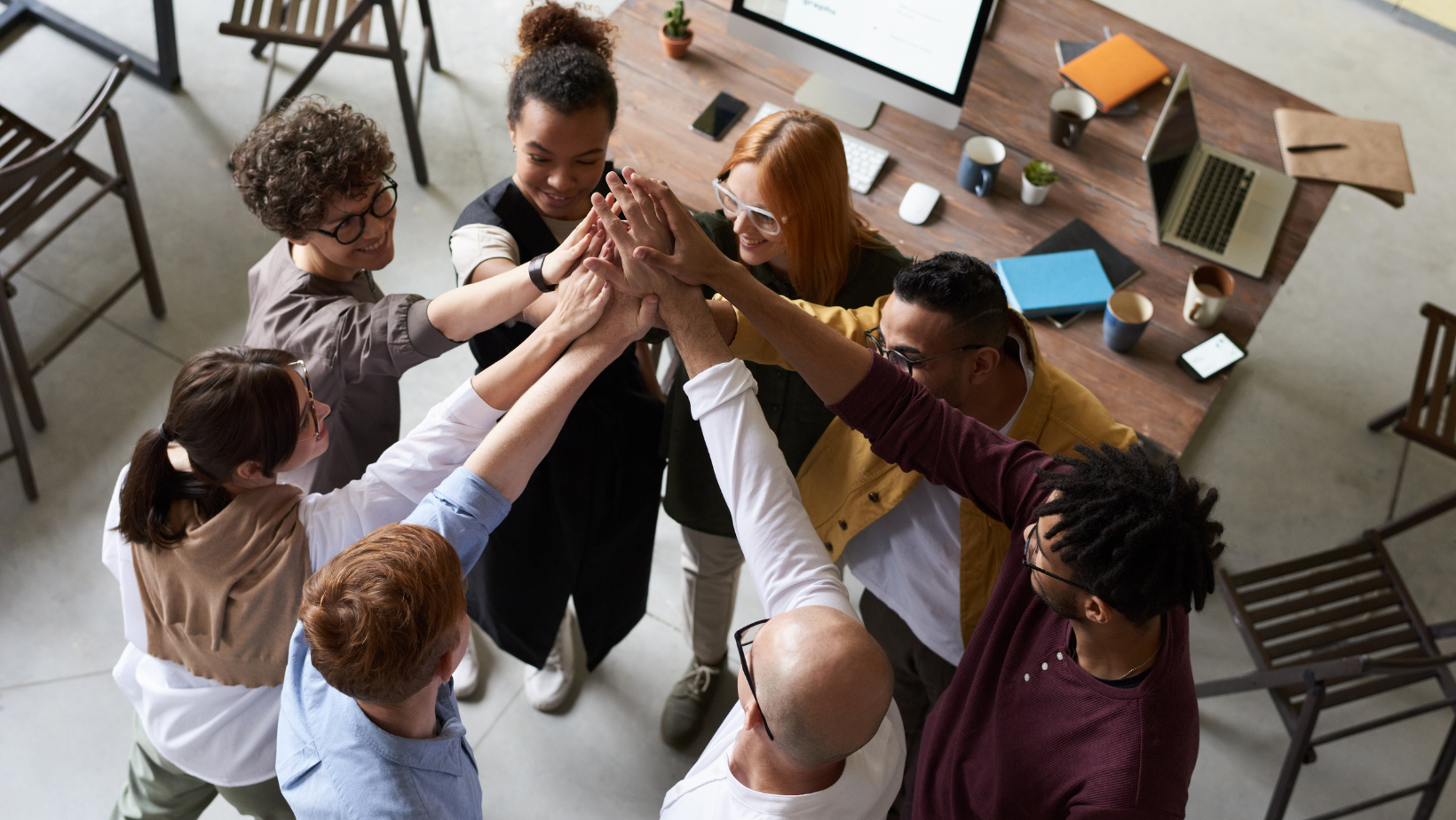 Diversity and Inclusion picture. Team work people in a circle all hands in