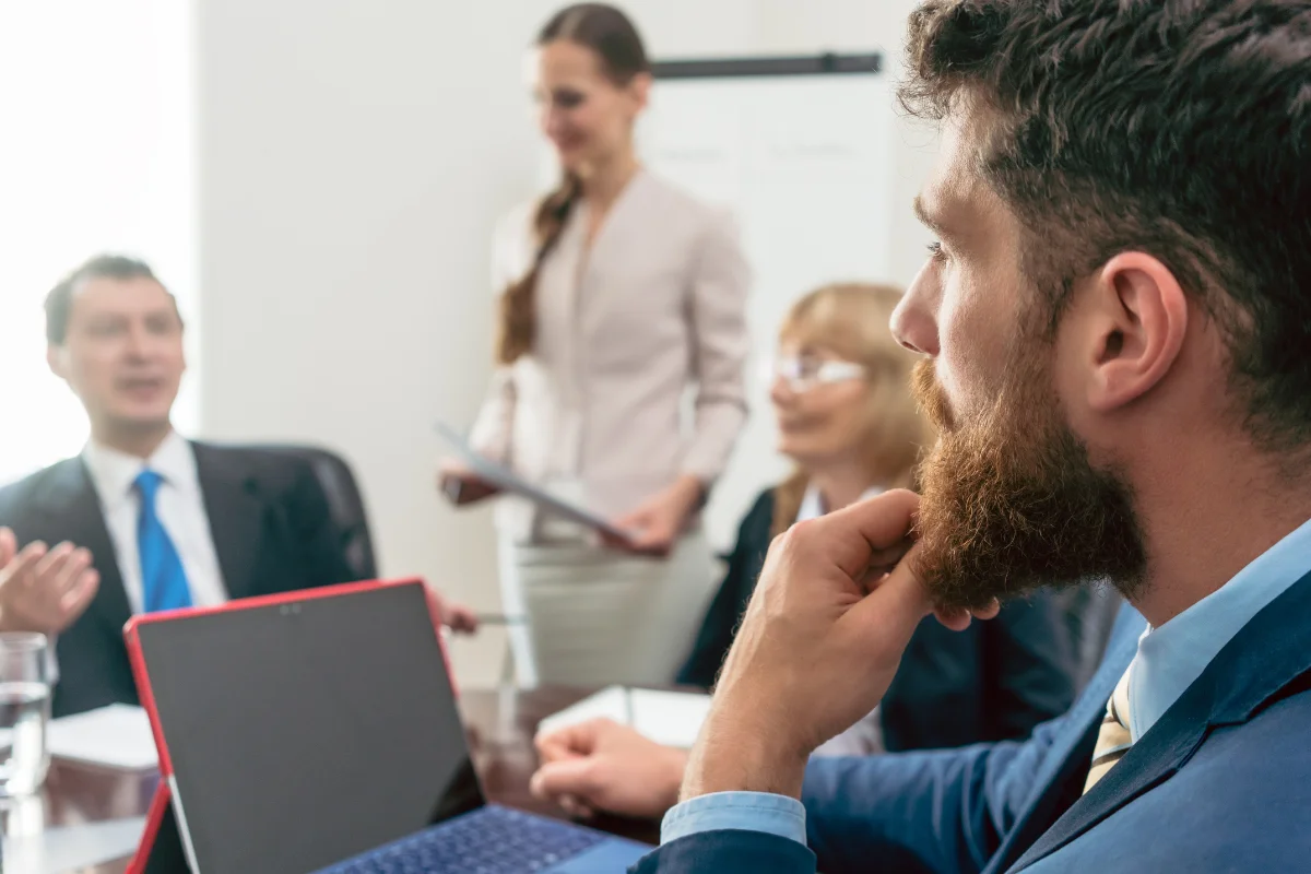 Man listens attentively during a meeting