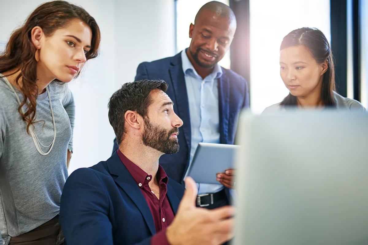 Colleagues engaged in a work discussion