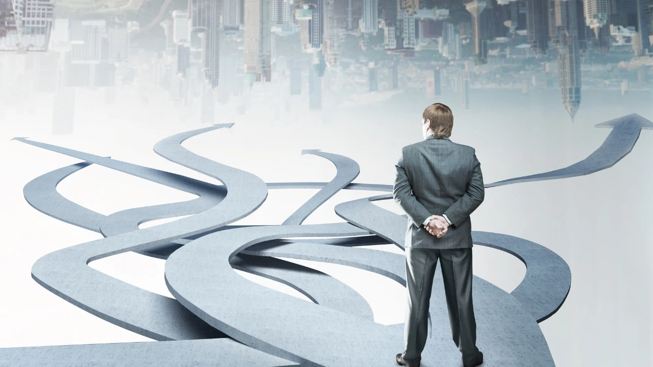 A businessman in a suit stands with hands behind his back, pondering a complex, winding path leading toward different directions in cityscape
