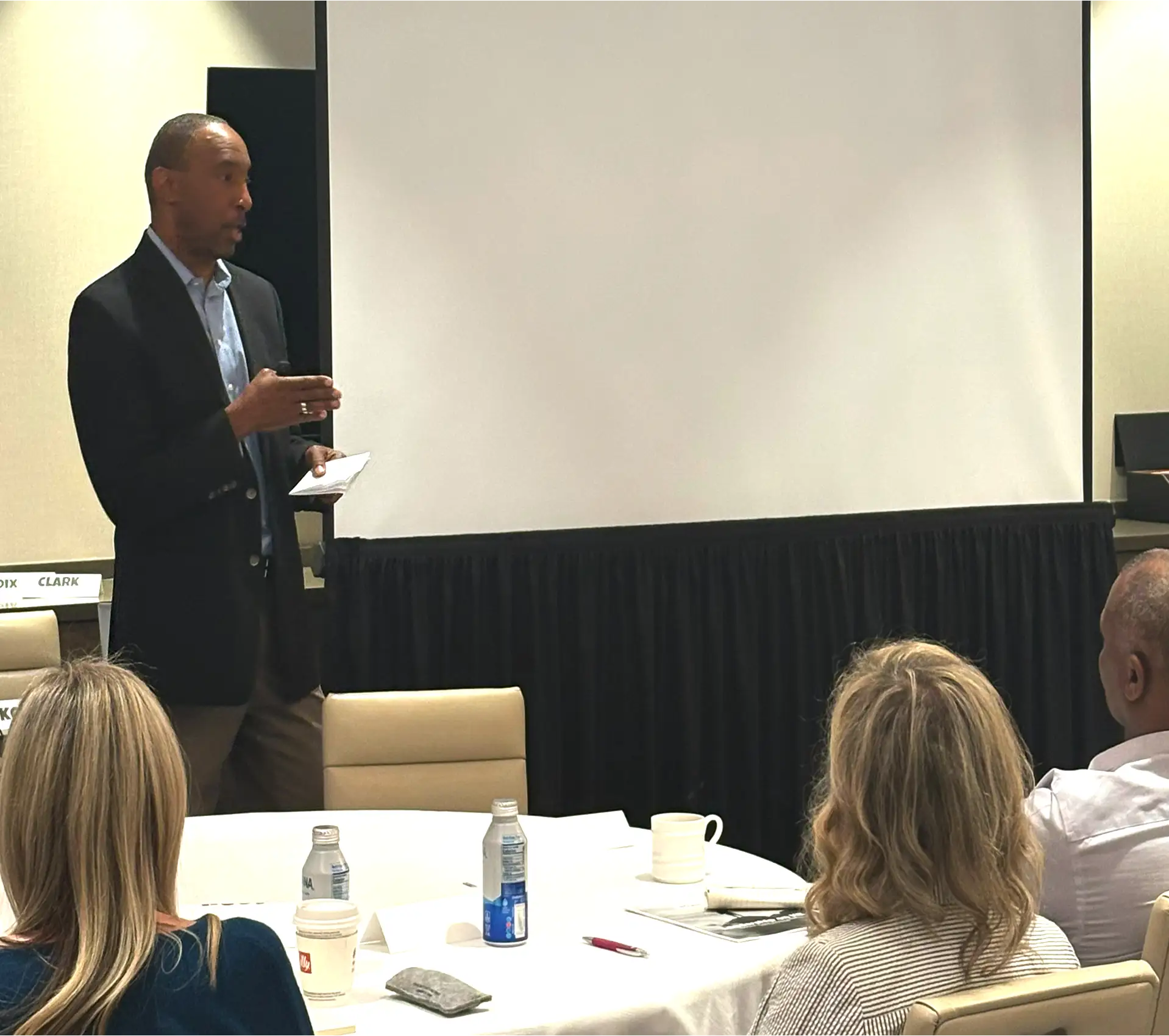 An image of Keith doing discussion in front of attendees