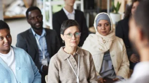 A group of people listening to a talk.